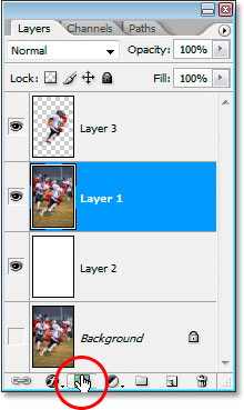 Clicking the 'Add A Layer Mask' icon at the bottom of the Layers palette.